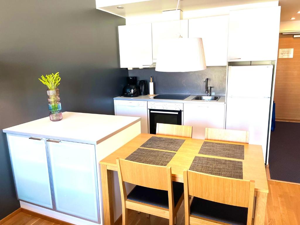 Kuchyň nebo kuchyňský kout v ubytování Premium Chalet 4212 Green