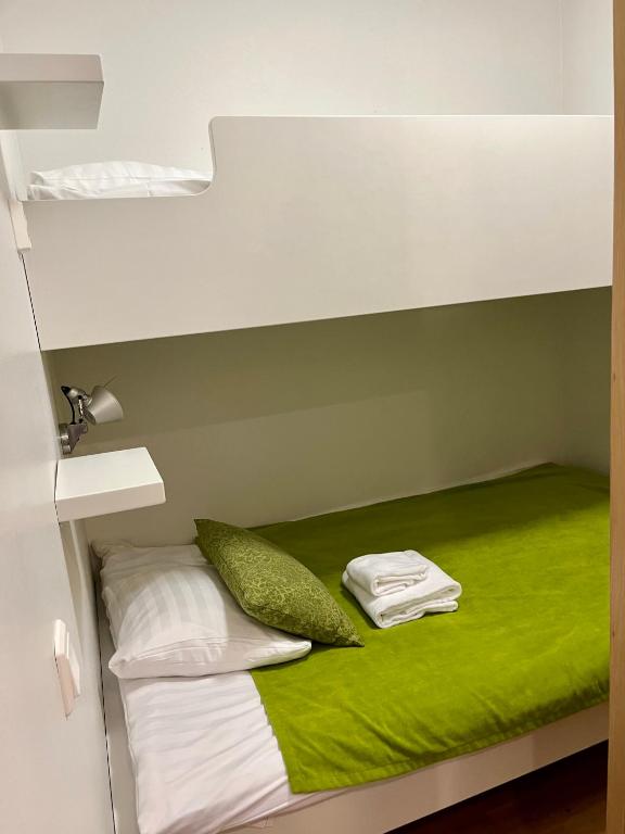 Postel nebo postele na pokoji v ubytování Premium Chalet 4212 Green
