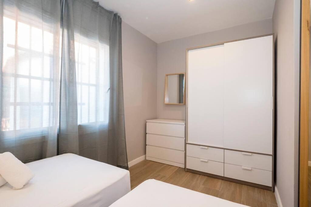 Posteľ alebo postele v izbe v ubytovaní BeBarceloner Sant Andreu Apartments - 3 bedrooms with terrace
