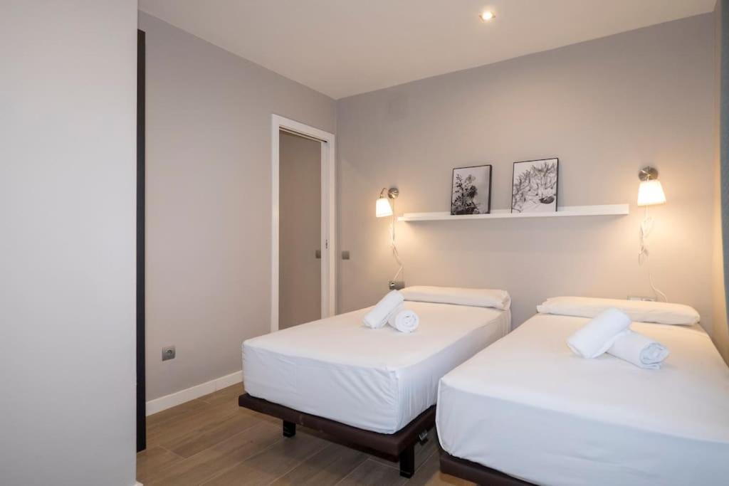 Posteľ alebo postele v izbe v ubytovaní BeBarceloner Sant Andreu Apartments - 3 bedrooms with terrace