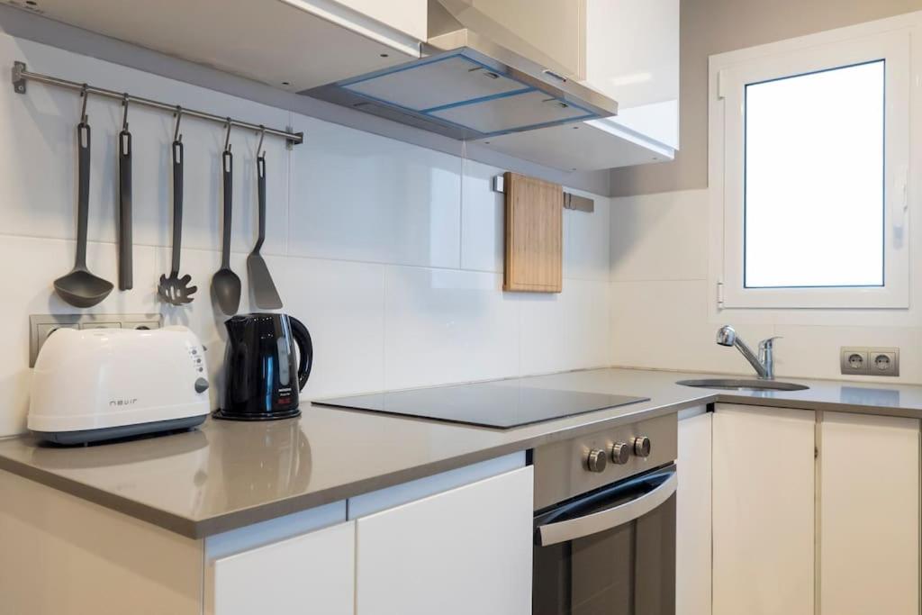 Kuchyňa alebo kuchynka v ubytovaní BeBarceloner Sant Andreu Apartments - 3 bedrooms with terrace
