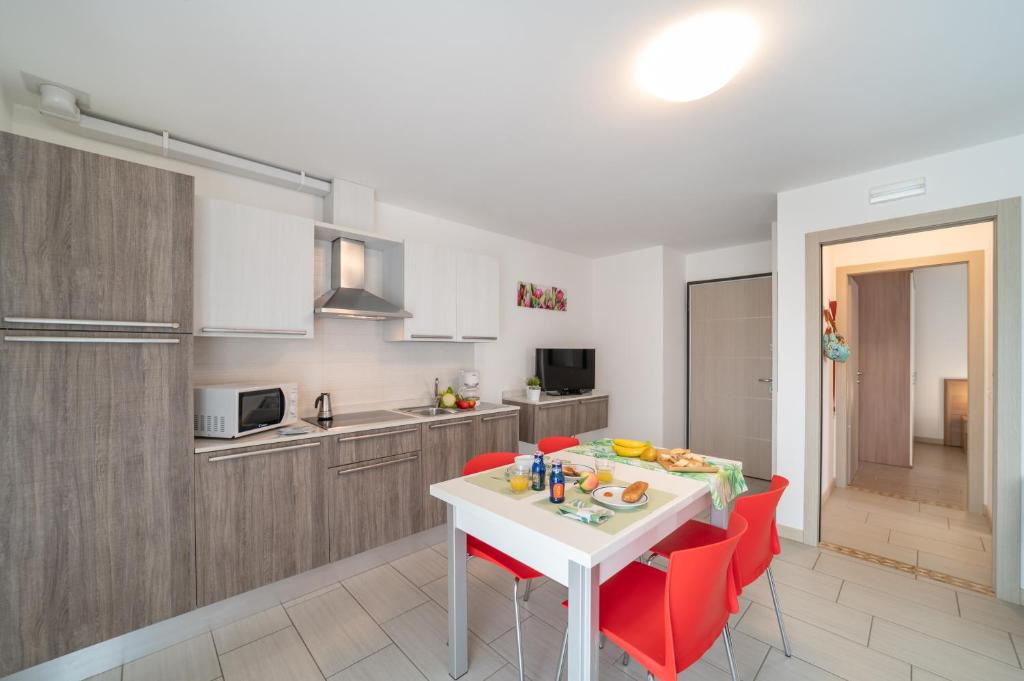 Kuchyň nebo kuchyňský kout v ubytování Residenza Monica