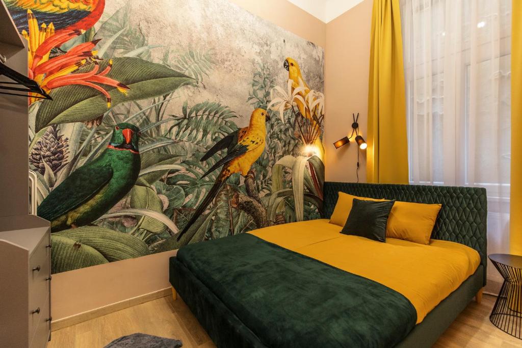 Posteľ alebo postele v izbe v ubytovaní E12 Boutique Apartments