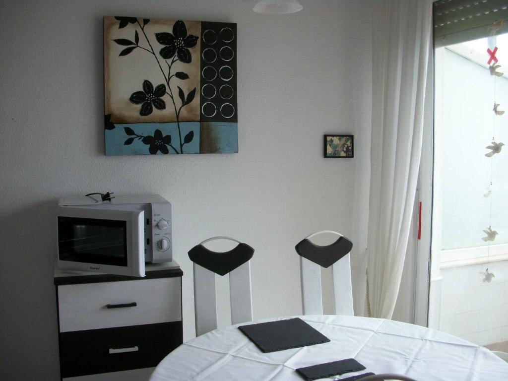 Kuchnia lub aneks kuchenny w obiekcie 1 Bedroom Penthouse On Front Line Of The Beach