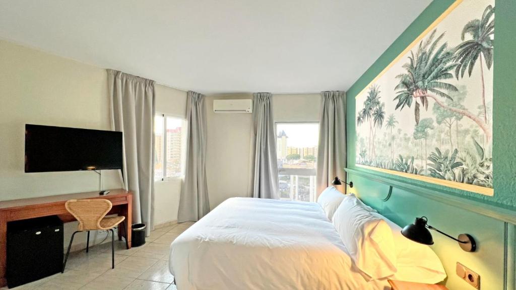 Säng eller sängar i ett rum på Moon Dreams Fuengirola