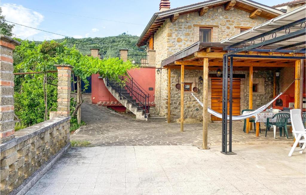 een huis met een glijbaan ervoor bij Stunning Home In Olevano Romano With Wifi in Olevano Romano