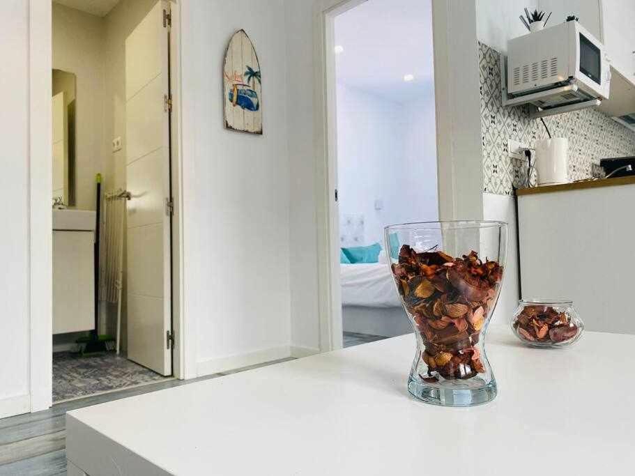 Kuchyňa alebo kuchynka v ubytovaní Bonito apartamento en 2º línea de playa & parking