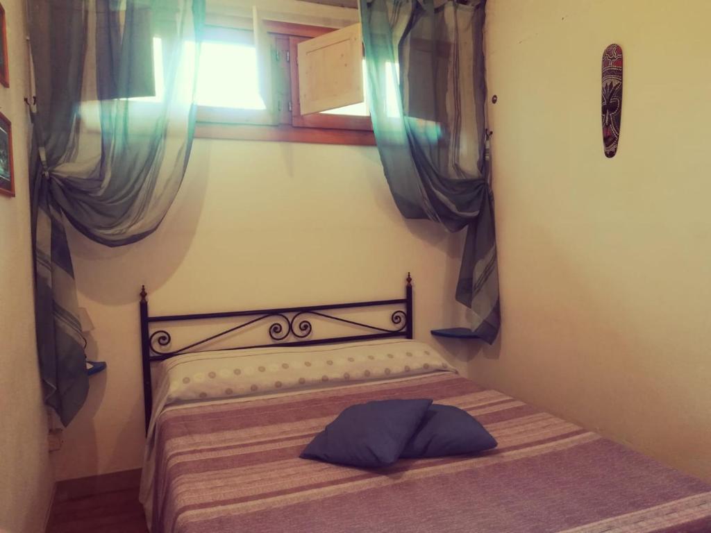 Posteľ alebo postele v izbe v ubytovaní Agriturismo Botro