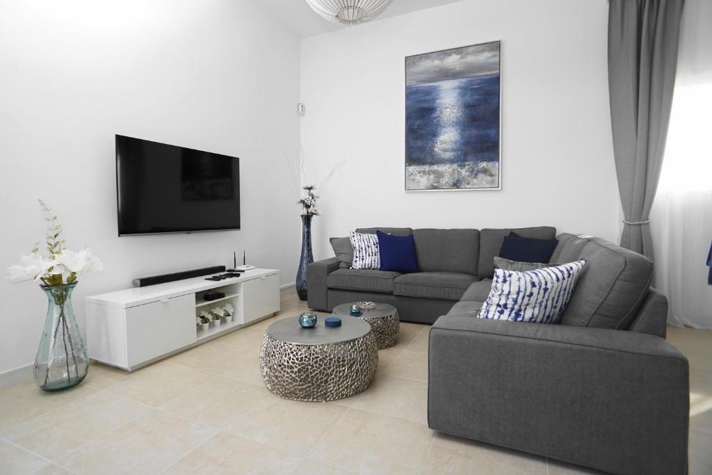 TV a/nebo společenská místnost v ubytování Villa Patricia Playa Blanca