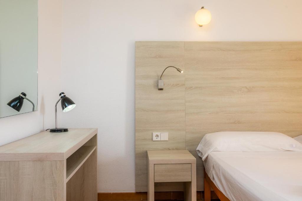 Posteľ alebo postele v izbe v ubytovaní Apto con Terraza 402