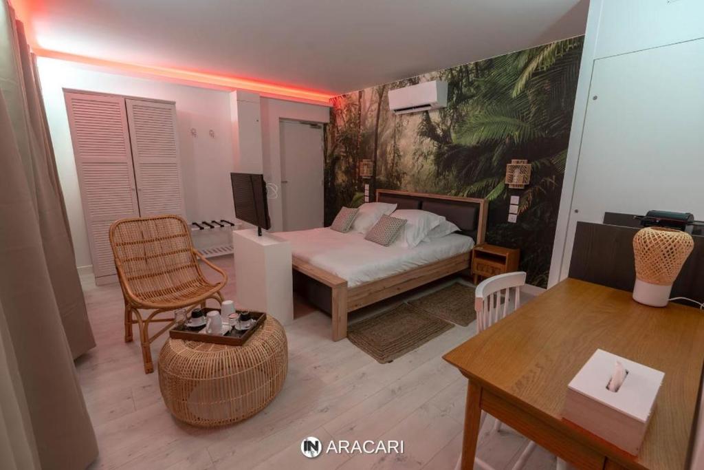 Cama o camas de una habitación en Aracari