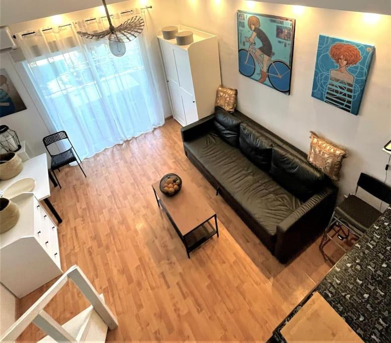 Posezení v ubytování klimatyczny loft i egzotyczny basen