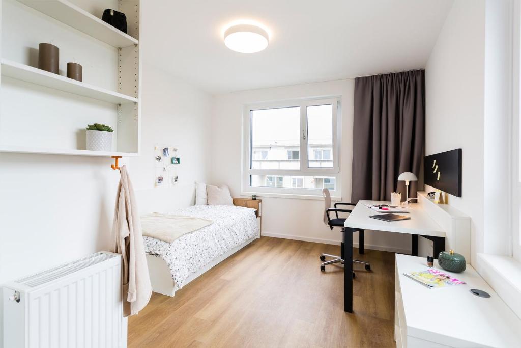 A bed or beds in a room at smartments Graz