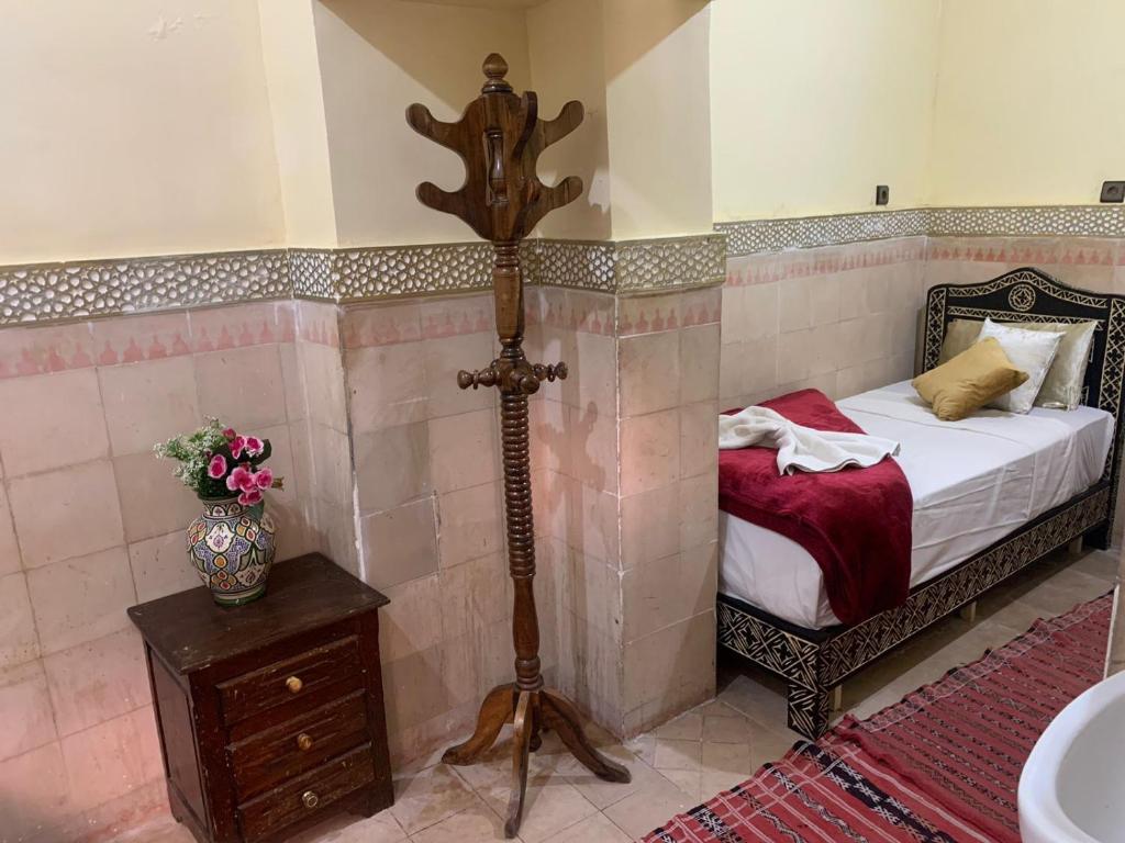 Postel nebo postele na pokoji v ubytování Riad Douja