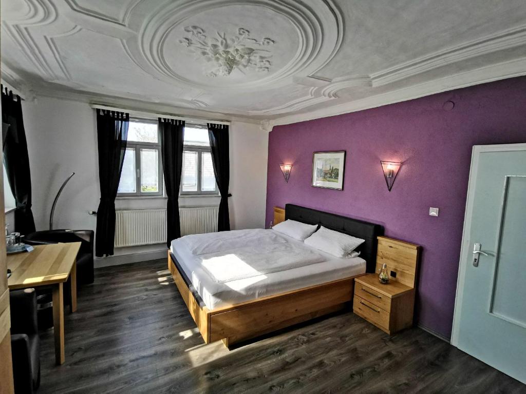 Postel nebo postele na pokoji v ubytování Gasthof Goldener Stern