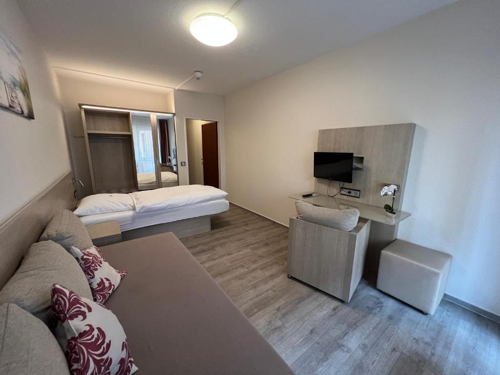 Postel nebo postele na pokoji v ubytování Hotel am Stern Uelzen