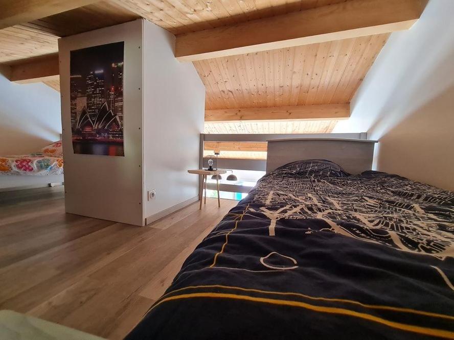 Posteľ alebo postele v izbe v ubytovaní LES MARAICHINES PISCINE COLLECTIVE
