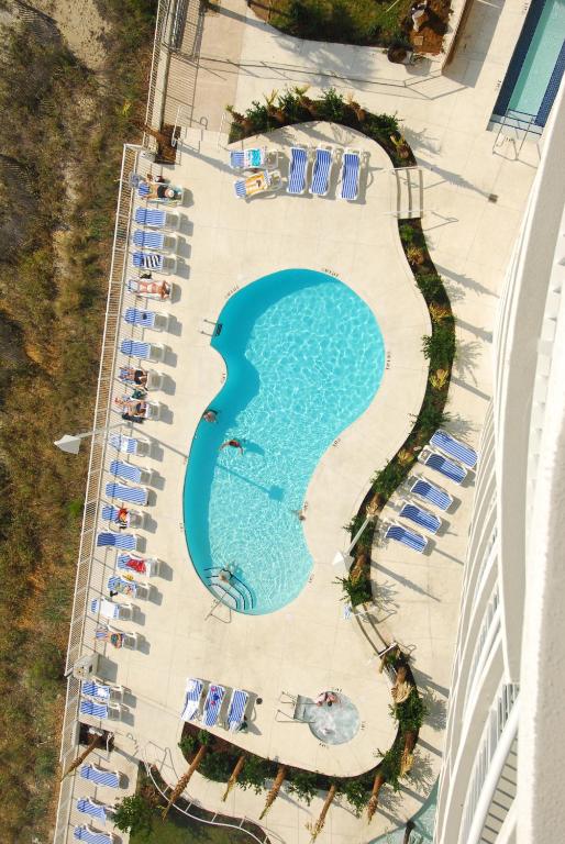 an aerial view of a swimming pool at a resort at Sandy Beach Resort in Myrtle Beach