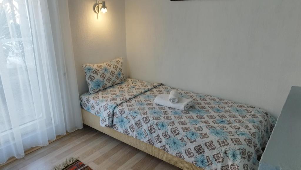 Postel nebo postele na pokoji v ubytování Cemils Guest House
