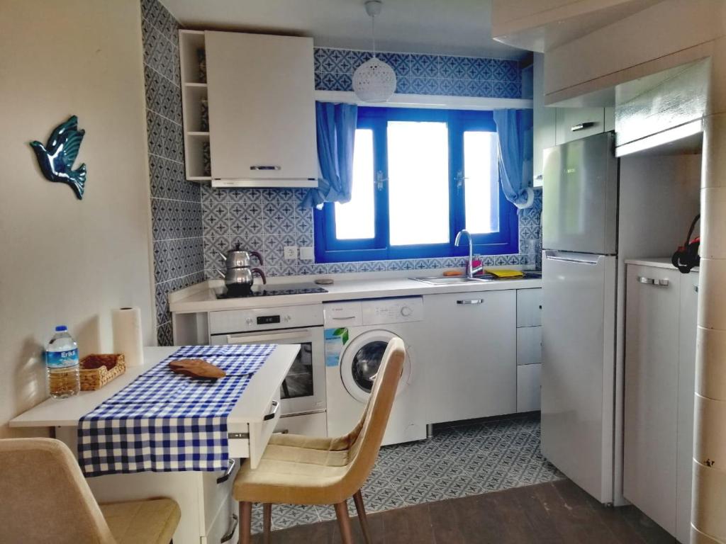 Kuchyň nebo kuchyňský kout v ubytování Mitos Hotel
