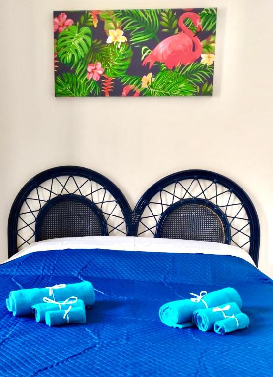A bed or beds in a room at DGS APARTHOTEL