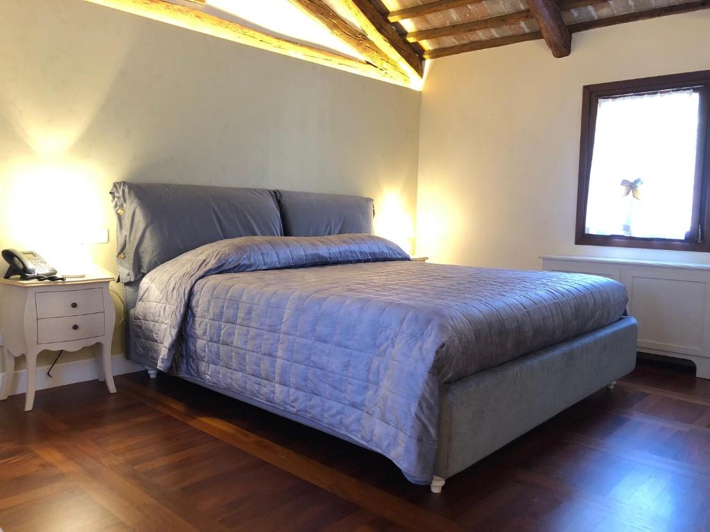 Postel nebo postele na pokoji v ubytování Hotel Donna Lucia