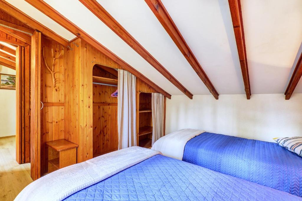 Postel nebo postele na pokoji v ubytování Casa Aromatica Maria
