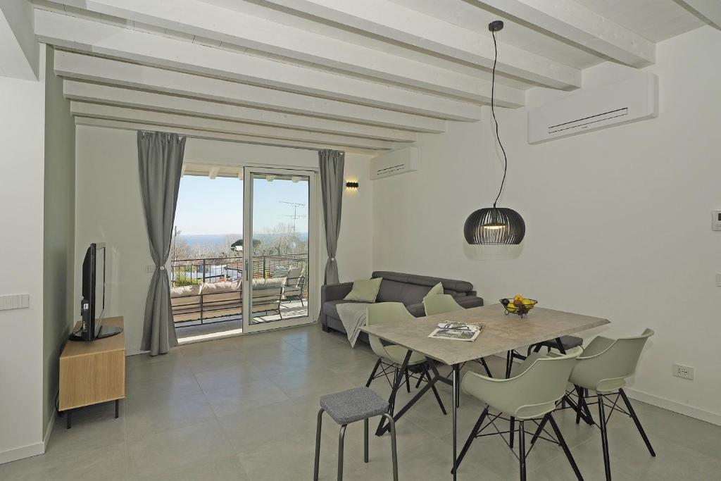 A television and/or entertainment centre at La Cittadella P1-14 by Wonderful Italy