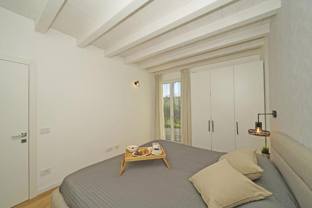 A bed or beds in a room at La Cittadella P1-14 by Wonderful Italy