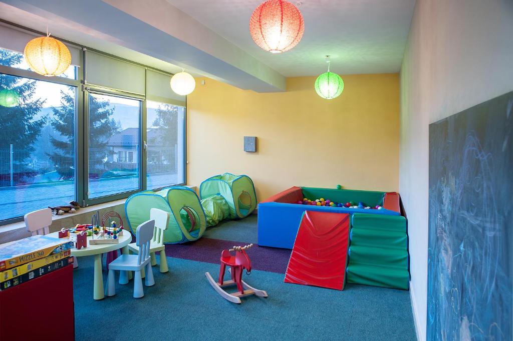 Posezení v ubytování Apartamenty Czerwone Maki Wisła