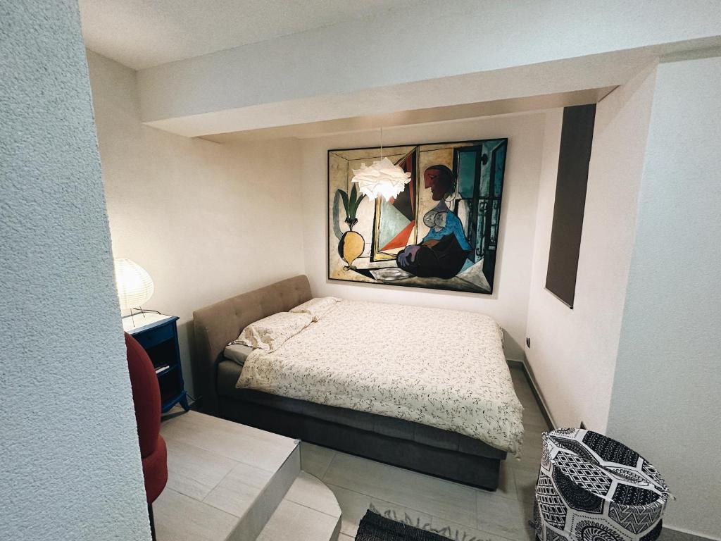 Ein Bett oder Betten in einem Zimmer der Unterkunft Apartment Picasso Selce