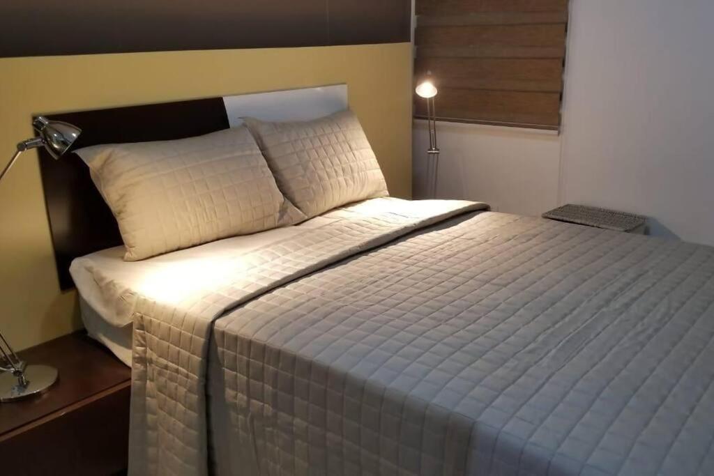 Postel nebo postele na pokoji v ubytování Vip Lounge with jacuzzi