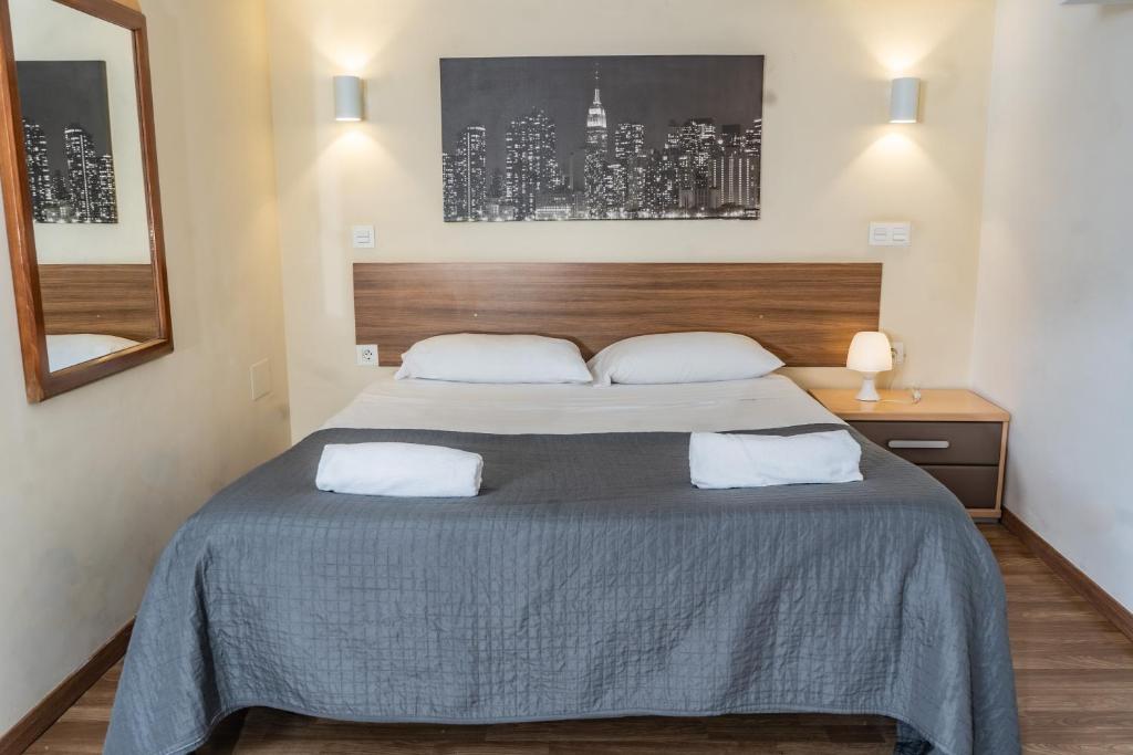 Postel nebo postele na pokoji v ubytování Apartamentos Turísticos Centro Histórico, by CartagenaSpain