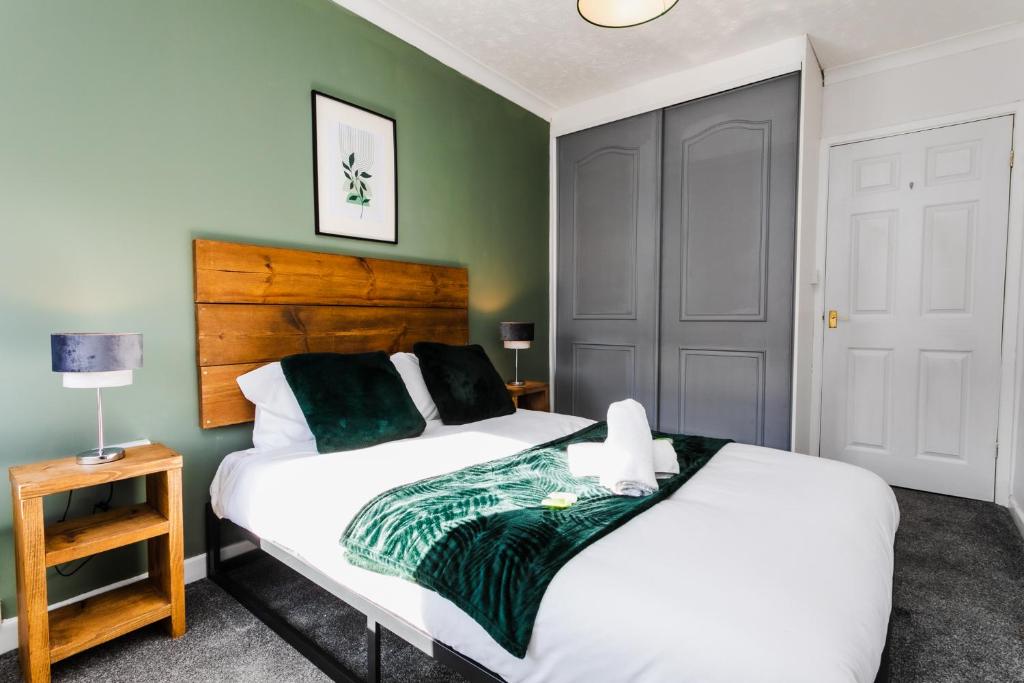 מיטה או מיטות בחדר ב-Baxter Place - Cosy Home-Sleeps 4-Wifi-Parking