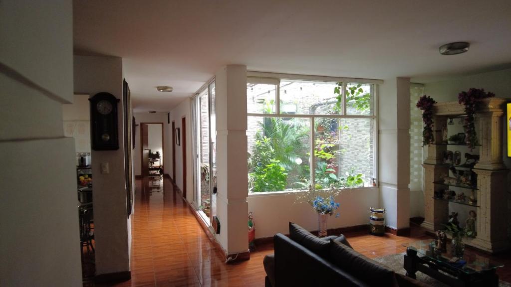 Posezení v ubytování Noras Homestay Laureles