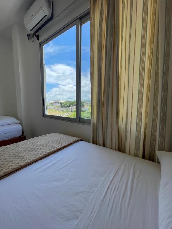 Postel nebo postele na pokoji v ubytování Samana Hostal, Puerto Engabao