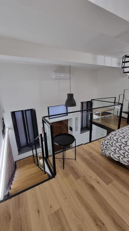 Łóżko lub łóżka w pokoju w obiekcie Home Catania Dante Accommodations