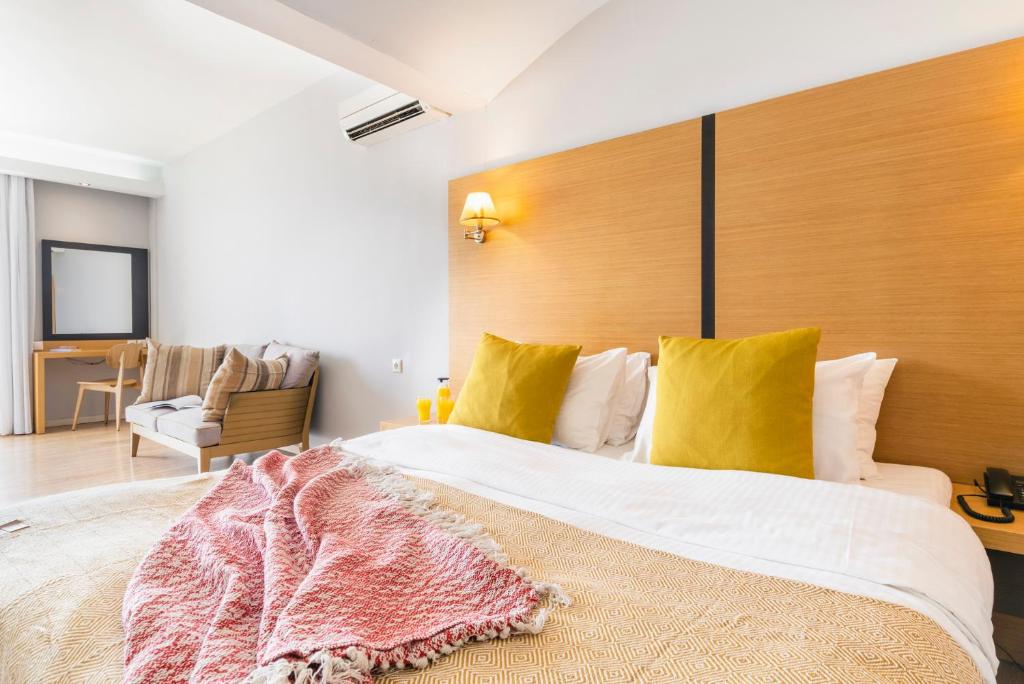 Postel nebo postele na pokoji v ubytování Hotel Lefkas