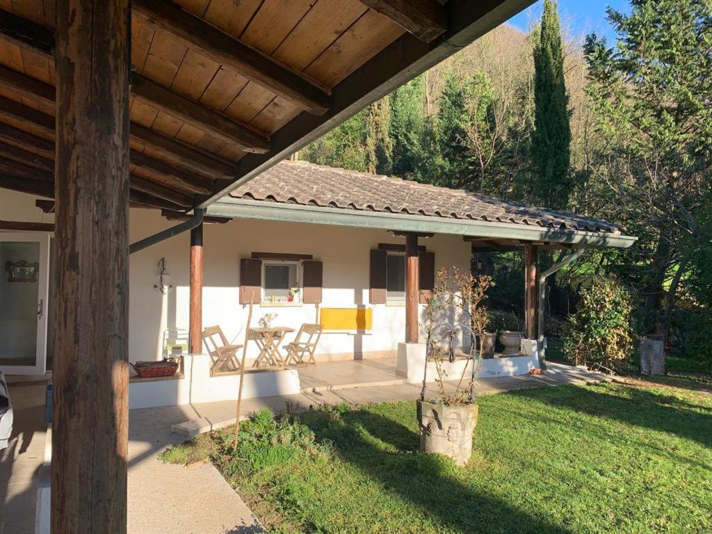 a patio of a house with a roof at Il Bagolaro in Feriole