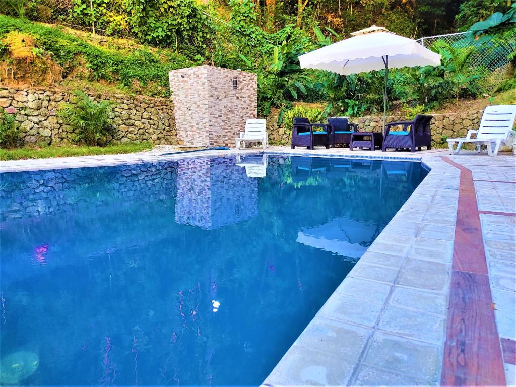 Bazén v ubytování Green Village By Hospedify, Hermosa Villa En Las Alturas con Piscina, Billar, y BBQ nebo v jeho okolí