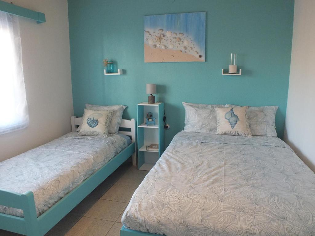 A bed or beds in a room at Asprovalta Family Villas