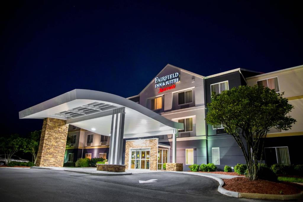 a rendering of the front of a hotel at night at Fairfield Inn & Suites Fredericksburg in Fredericksburg