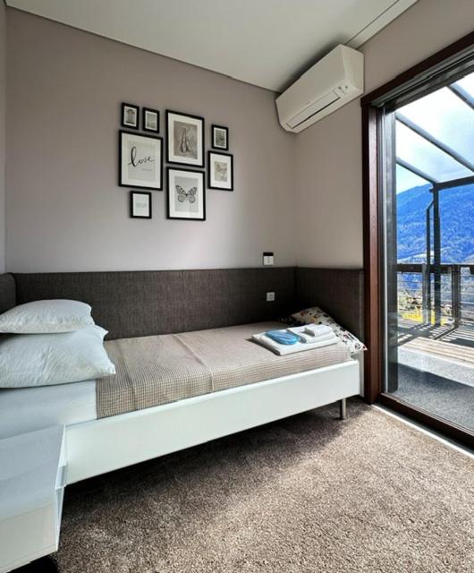 Posteľ alebo postele v izbe v ubytovaní VILLA COLLINA VERDE