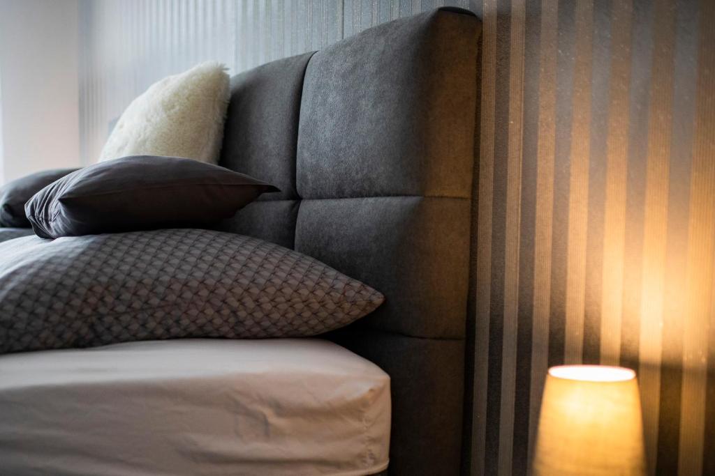 Łóżko lub łóżka w pokoju w obiekcie Csipke Apartman