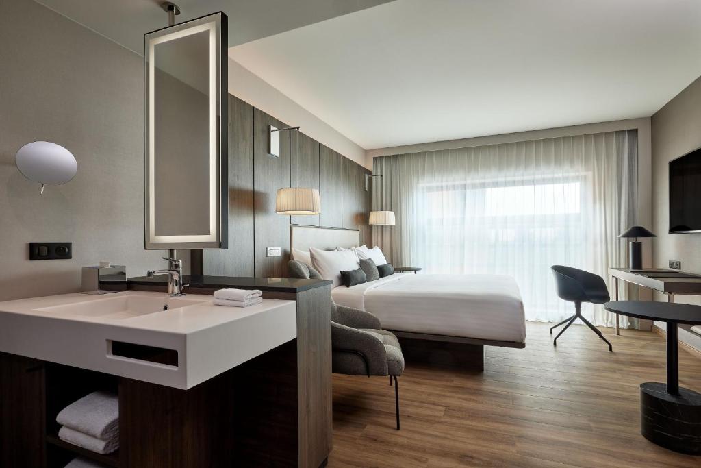 Postel nebo postele na pokoji v ubytování AC Hotel by Marriott Strasbourg
