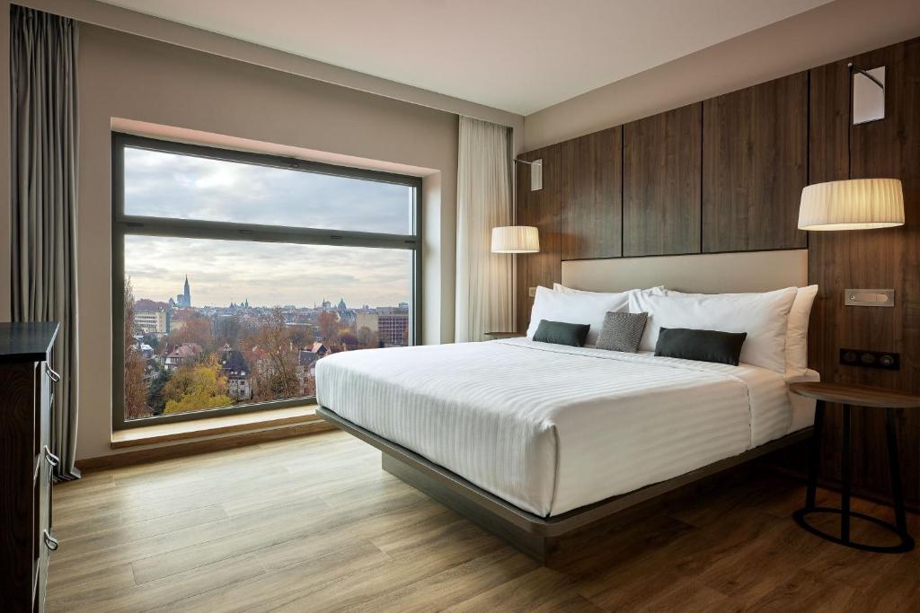 Postel nebo postele na pokoji v ubytování AC Hotel by Marriott Strasbourg