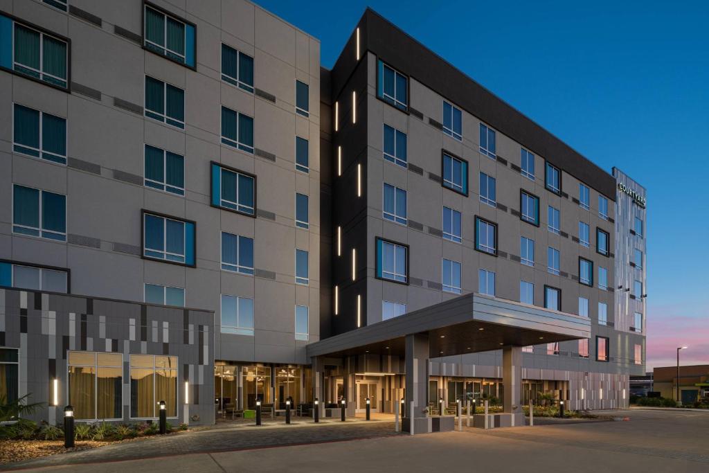 a rendering of the front of a building at Courtyard by Marriott Houston I-10 West/Memorial in Houston