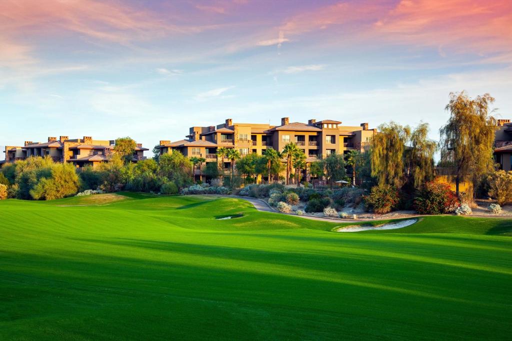 a view of a golf course with a resort at The Westin Desert Willow Villas, Palm Desert in Palm Desert