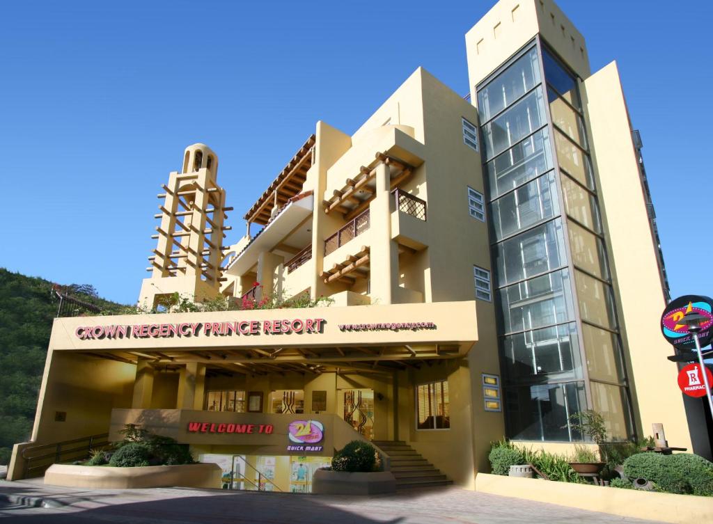 a building with a sign in front of it at Crown Regency Prince Resort in Boracay