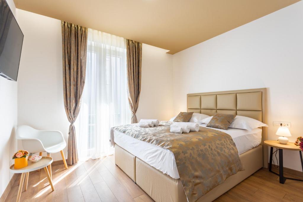 Posteľ alebo postele v izbe v ubytovaní Luxury Rooms Fetivi